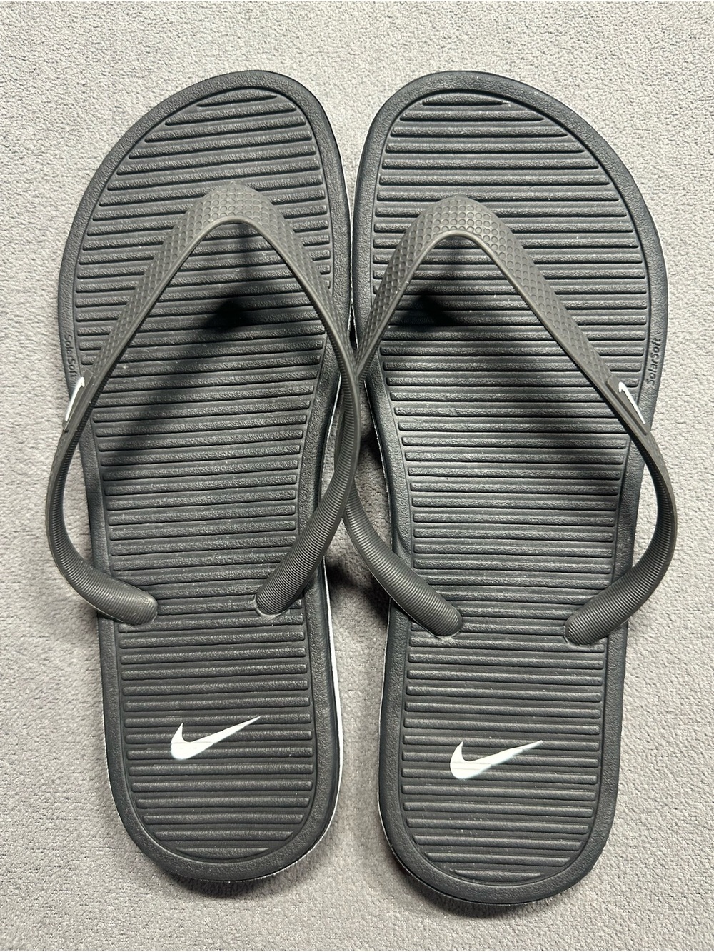 Nike Black Flip-Flop Sandals with White Swoosh